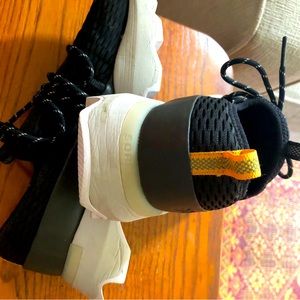 Sorel sneakers slip on with lace. Barely worn, 8.5 black.